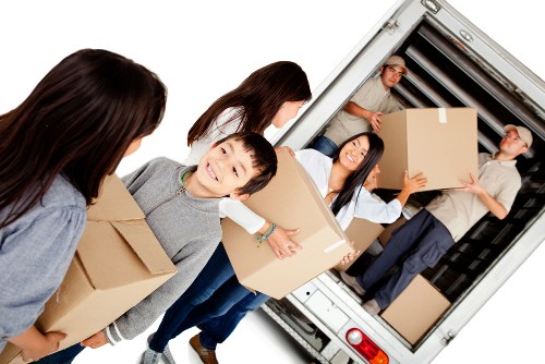 Moving van and packed boxes for removals in Barnet