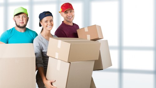 Boxes and household items arranged in a self storage unit in Barnet
